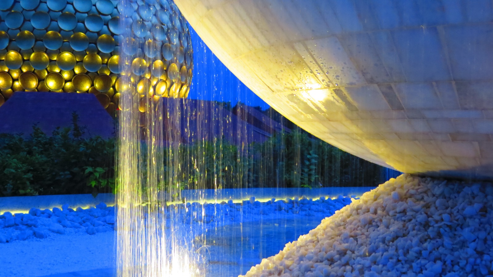 Lalit picture matrimandir blue water